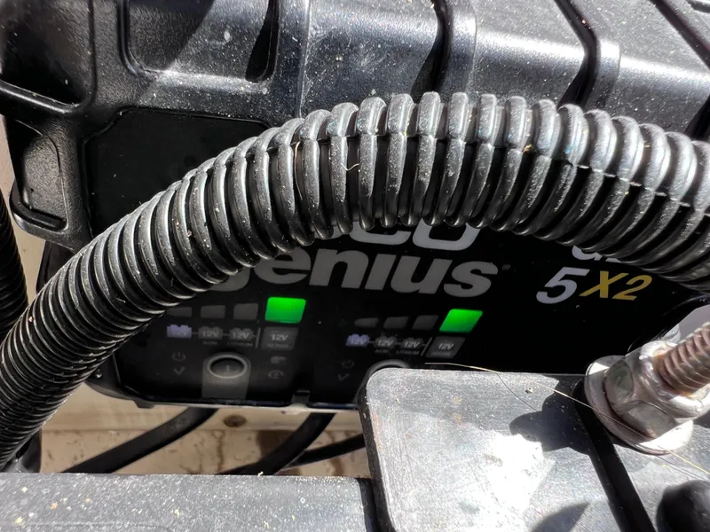 Slide: The Image of Close-up of a Noco Genius 5X2 battery charger on a 2016 Boston Whaler 210 Montauk. - 16