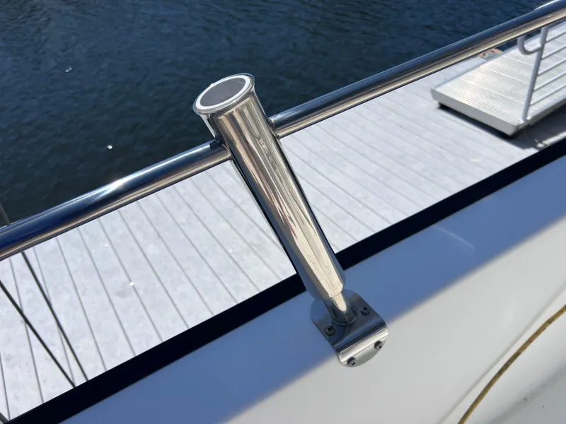 Slide: The Image of Stainless steel rod holder on 2016 Boston Whaler 210 Montauk boat, dockside view. - 18