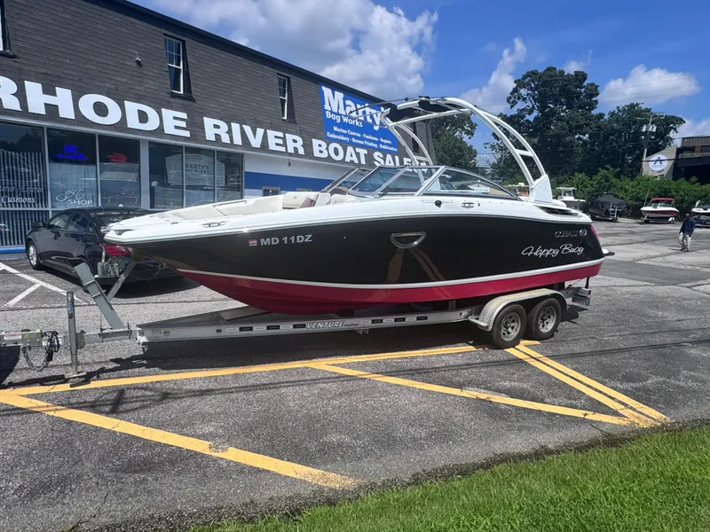 Slide: The Image of 2013 Cobalt 24SD boat on trailer at Rhode River Boat Sales. - 2