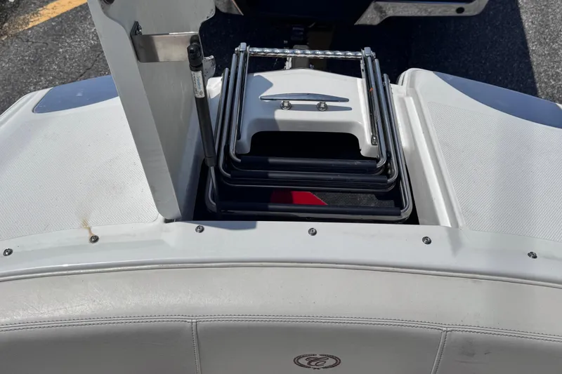Slide: The Image of 2013 Cobalt 24SD boat swim platform with foldable ladder. - 25