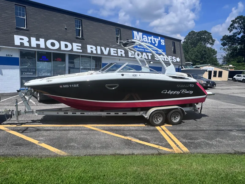Slide: The Image of 2013 Cobalt 24SD boat on trailer at Rhode River Boat Sales. - 3