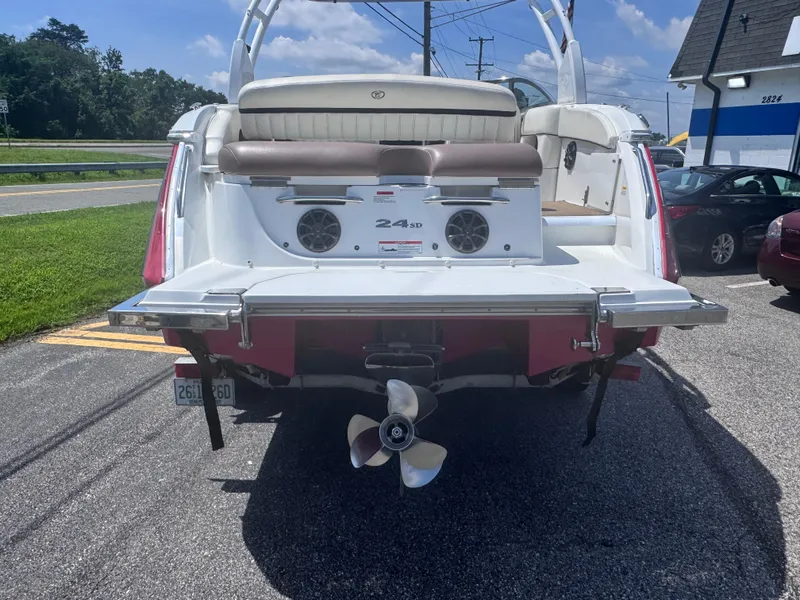 Slide: The Image of Rear view of a 2013 Cobalt 24SD boat with propeller and seating. - 7
