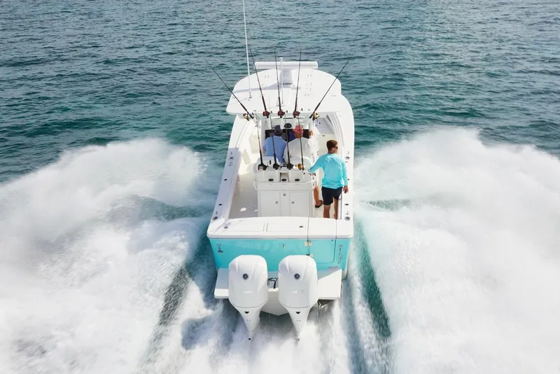 Slide: The Image of Overhead view of a 2026 Regulator 28 boat on a concrete surface. - 4