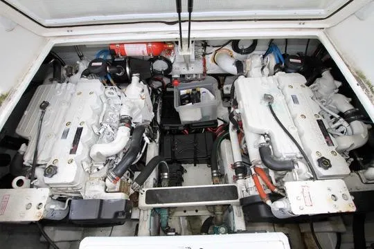 Slide: The Image of Engine room of 2006 Harbor Master Coastal 400 with dual engines and fire extinguisher. - 16