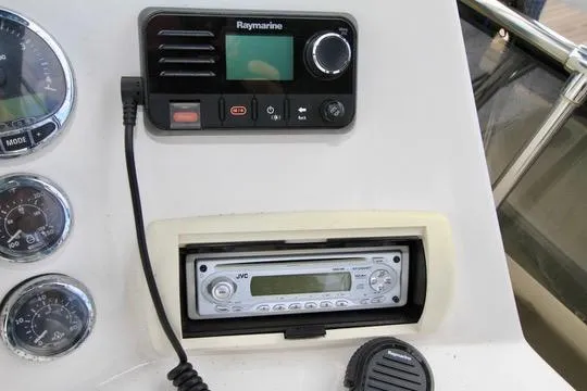 Slide: The Image of Control panel of 2006 Harbor Master Coastal 400 with Raymarine and JVC systems. - 26