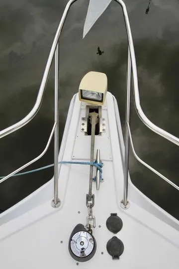 Slide: The Image of Bow of 2006 Harbor Master Coastal 400 boat with anchor and railing. - 31