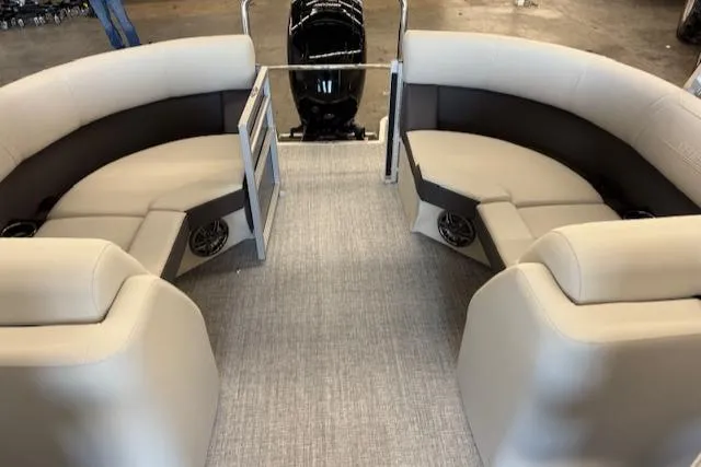Slide: The Image of 2025 Harris Cruiser 230 CWDH pontoon boat interior with plush seating and modern design. - 13
