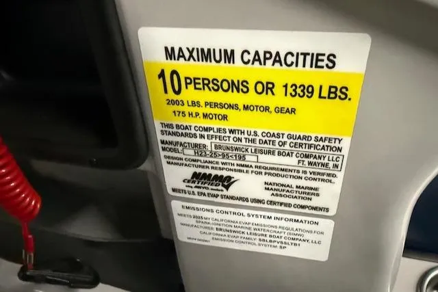 Slide: The Image of Maximum capacity label on 2025 Harris Cruiser 230 CWDH boat, 10 persons or 1339 lbs. - 18