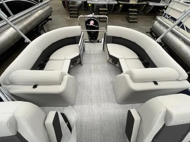 Slide: The Image of 2025 Harris Cruiser 210 pontoon boat interior with plush seating and modern design. - 7