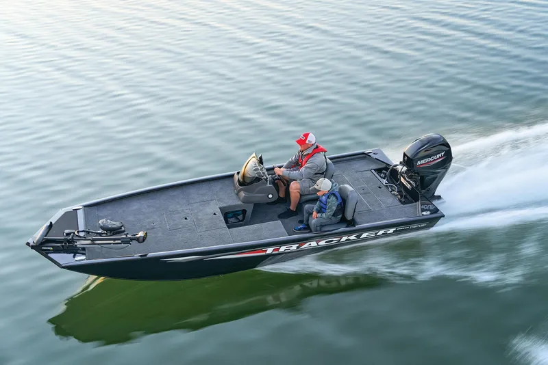 Slide: The Image of Manufacturer Provided Image: 2026 Tracker Pro 170 boat speeding on water with two passengers. - 44