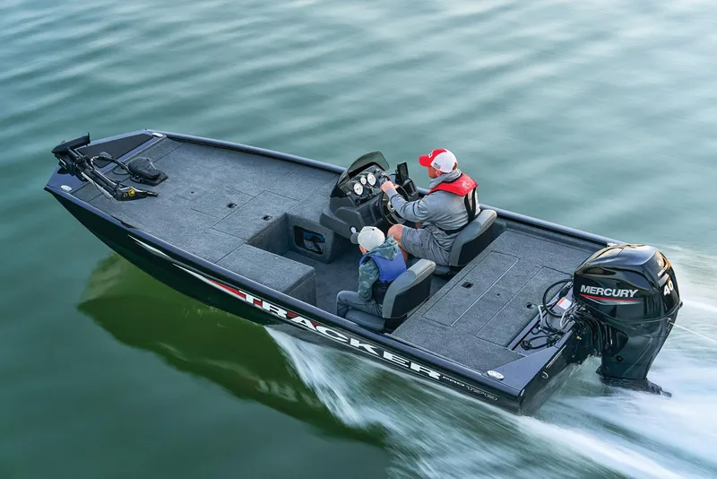 Slide: The Image of Manufacturer Provided Image: 2026 Tracker Pro 170 boat cruising on water with two passengers. - 45