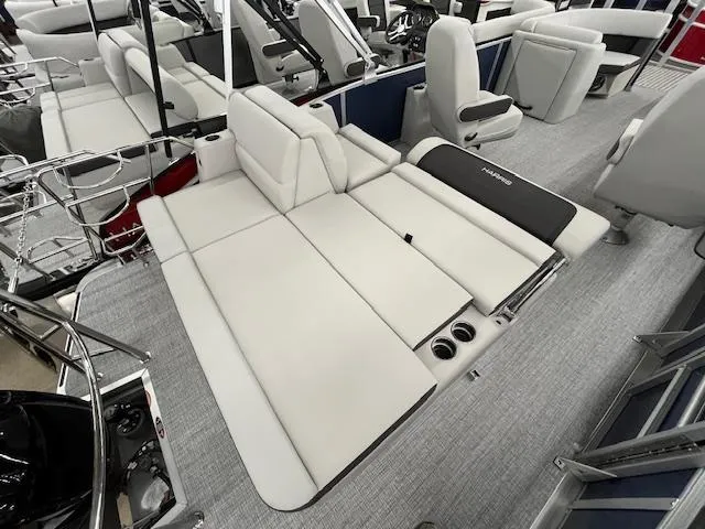 Slide: The Image of 2025 Harris Cruiser 210 boat interior with spacious seating and modern design. - 19
