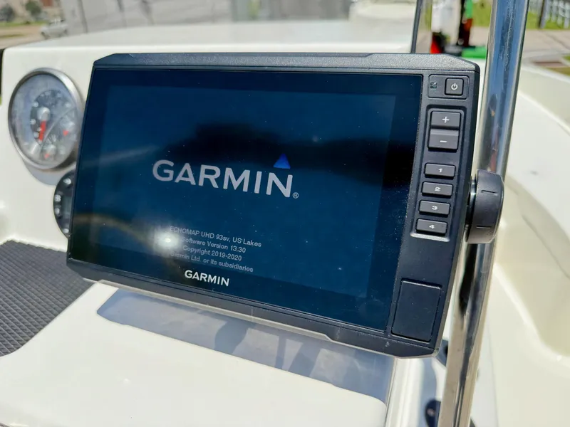 Slide: The Image of Garmin navigation system on 2020 Bayliner Element F21 boat dashboard. - 16