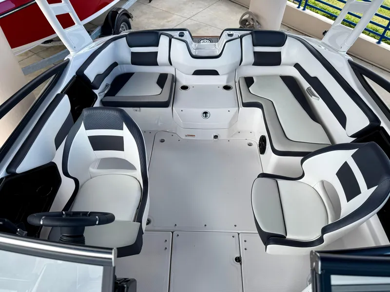 Slide: The Image of 2025 Yamaha Boats 195S interior, featuring sleek seating and modern design. - 9