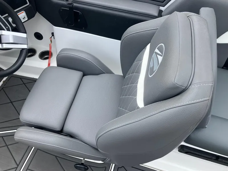 Slide: The Image of 2023 Tigé Z1 boat seat with gray upholstery and ergonomic design. - 11