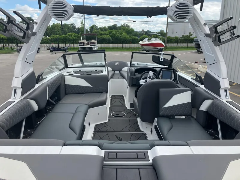 Slide: The Image of 2023 Tigé Z1 boat interior with sleek seating and modern dashboard design. - 6