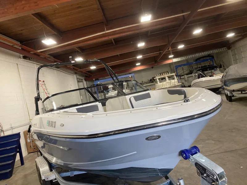 Slide: The Image of 2020 Bayliner VR6 boat in indoor storage facility. - 12
