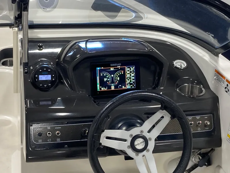 Slide: The Image of 2020 Bayliner VR6 dashboard with steering wheel and digital display. - 3