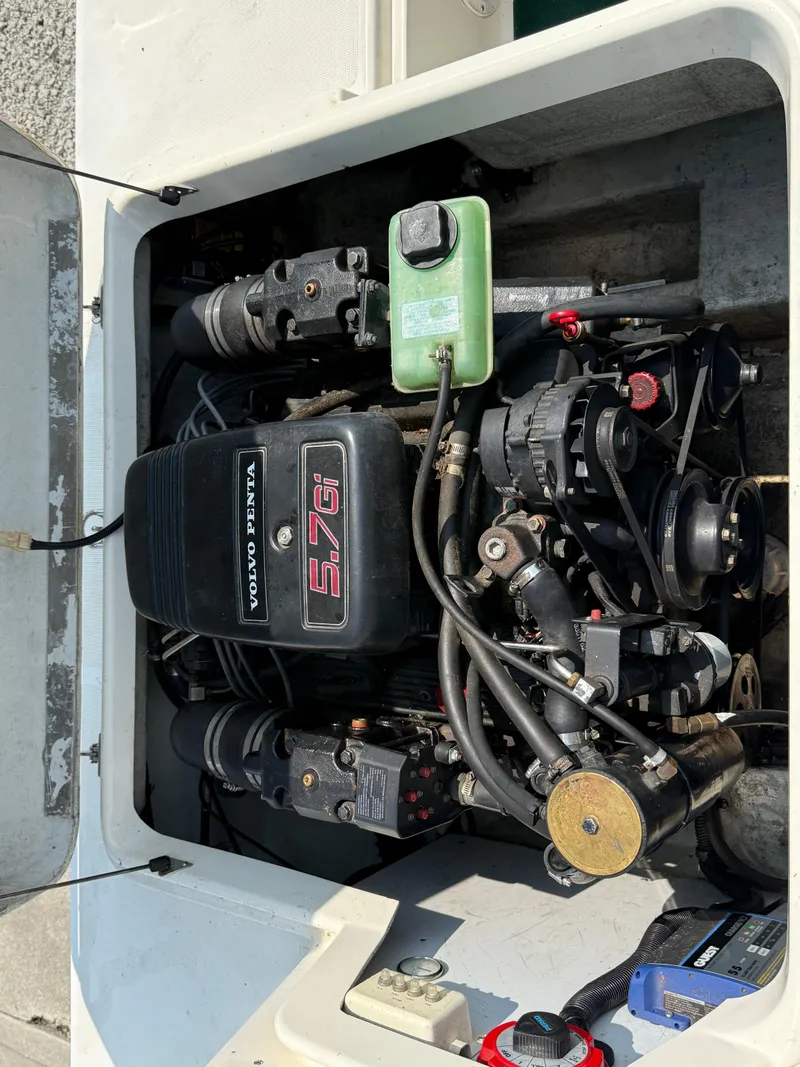 Slide: The Image of Engine compartment of a 1996 Pursuit 2460 Denali with Volvo Penta 5.7Gi engine. - 23