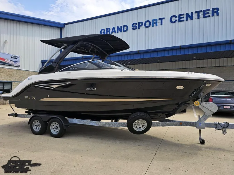 Slide: The Image of 2016 Sea Ray 250 SLX boat on trailer at Grand Sport Center. - 10