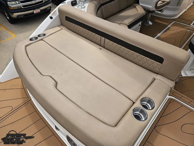Slide: The Image of Luxurious seating area on a 2016 Sea Ray 250 SLX boat with cup holders. - 30