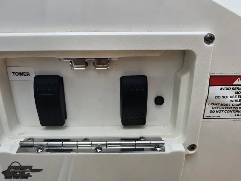 Slide: The Image of Control panel of a 2016 Sea Ray 250 SLX boat with switches and warning label. - 37