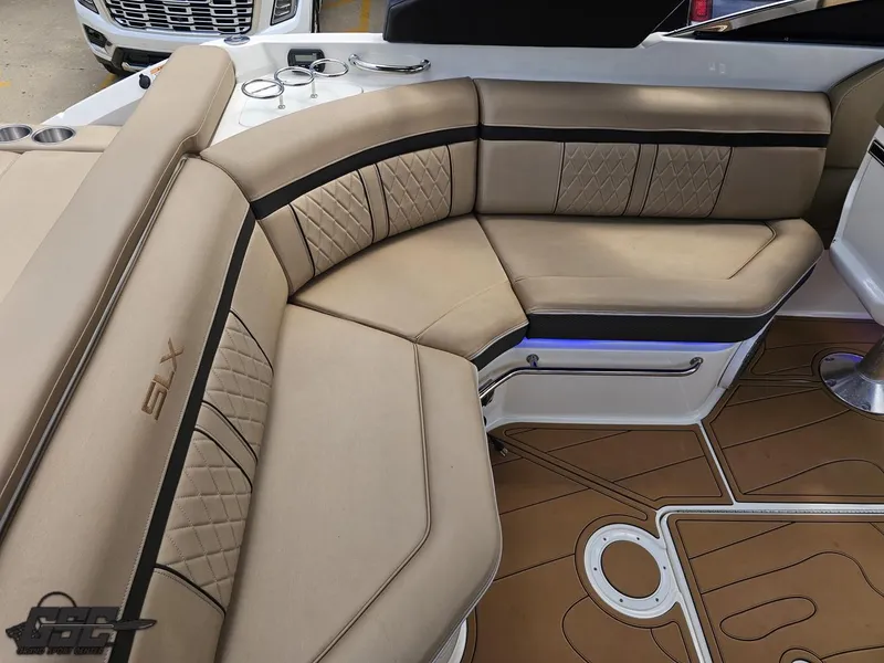 Slide: The Image of Luxurious seating on 2016 Sea Ray 250 SLX boat with tan upholstery and elegant design. - 42