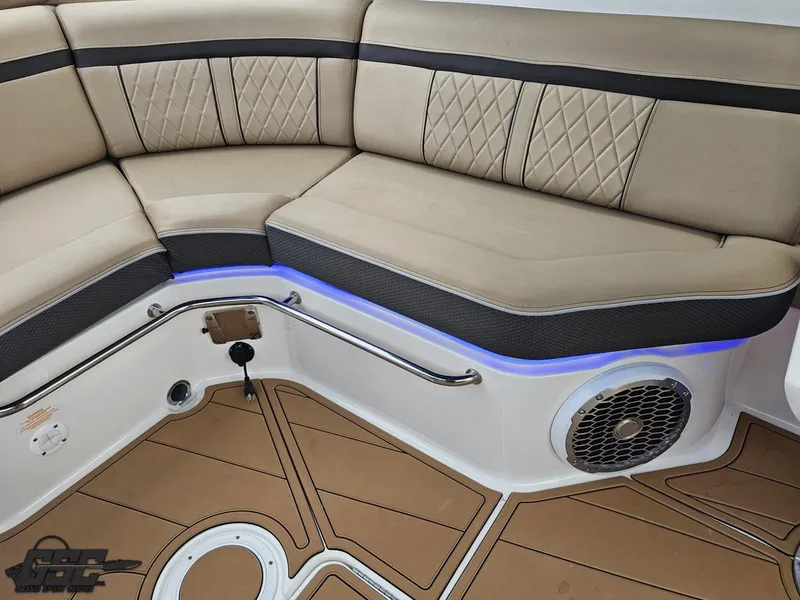 Slide: The Image of Luxurious seating on 2016 Sea Ray 250 SLX boat with elegant upholstery and ambient lighting. - 44