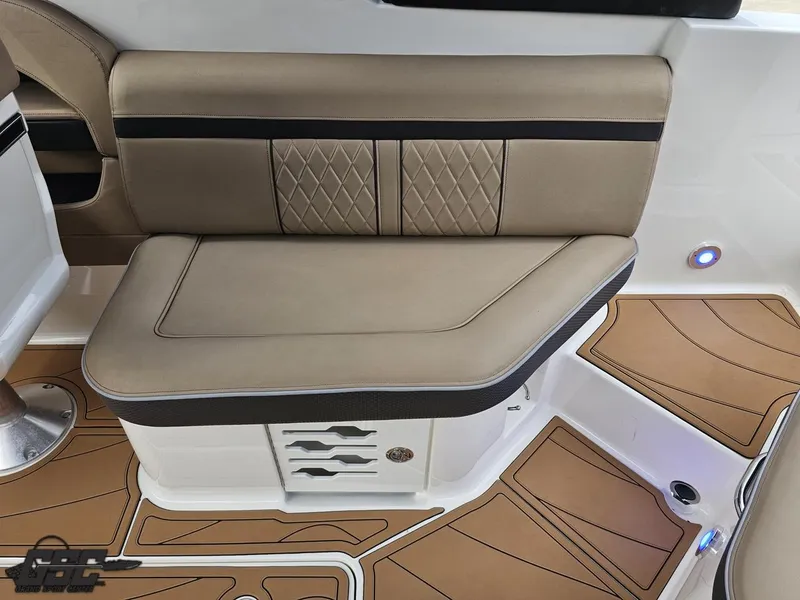 Slide: The Image of 2016 Sea Ray 250 SLX interior with tan seating and stylish flooring. - 45