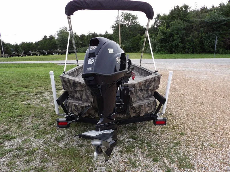 Slide: The Image of Rear view of 2021 Havoc VJST-C 1756 boat with outboard motor on trailer. - 11