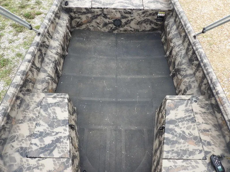 Slide: The Image of 2021 Havoc VJST-C 1756 boat interior with camouflage design and spacious seating. - 19