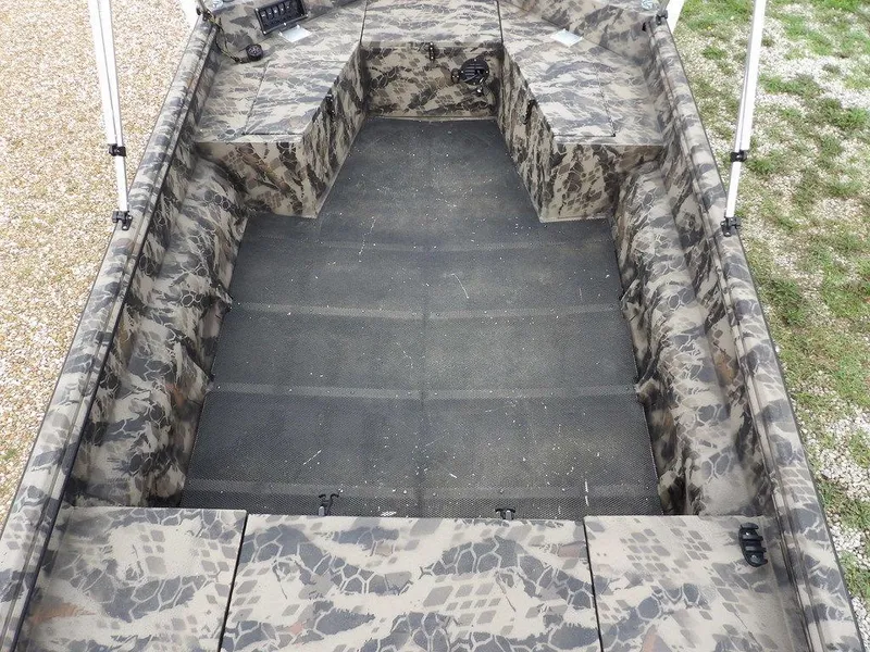 Slide: The Image of Camouflage interior of 2021 Havoc VJST-C 1756 boat, featuring spacious seating and storage. - 20