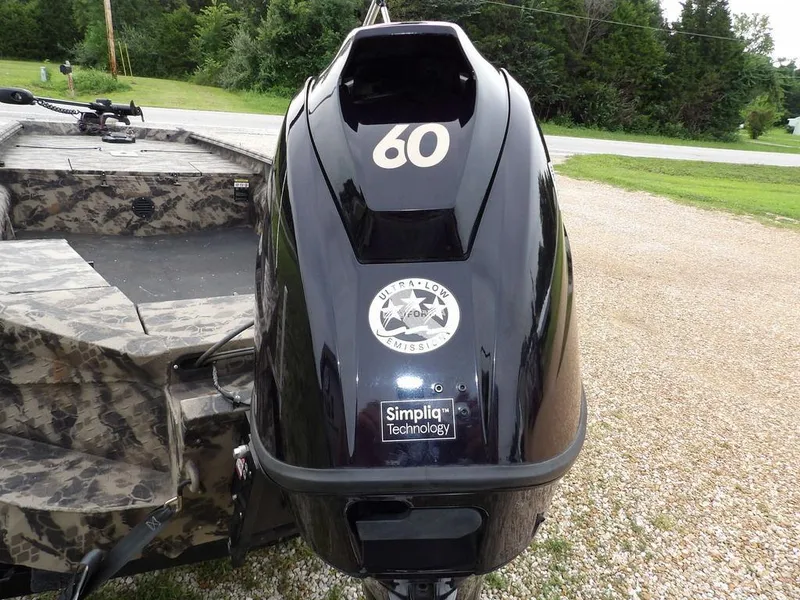 Slide: The Image of Outboard motor on a camo-patterned boat, featuring Havoc VJST-C 1756, 2021 model. - 30