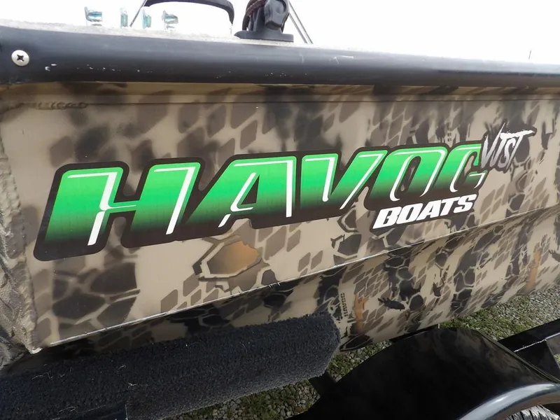 Slide: The Image of Camouflage-patterned 2021 Havoc VJST-C 1756 boat with bold green logo. - 34