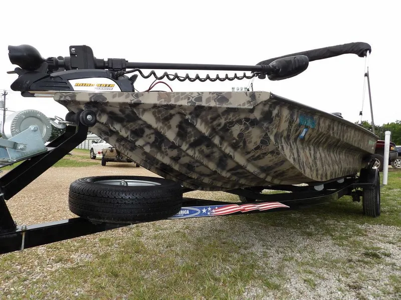 Slide: The Image of Camouflage-patterned 2021 Havoc VJST-C 1756 boat on trailer, featuring trolling motor. - 37