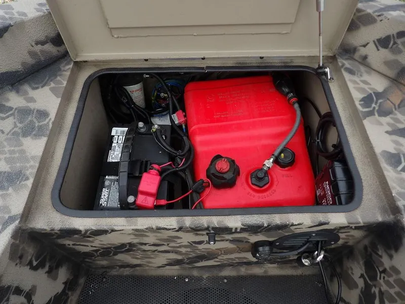 Slide: The Image of Boat storage compartment with battery and red fuel tank, Havoc VJST-C 1756, 2021 model. - 5