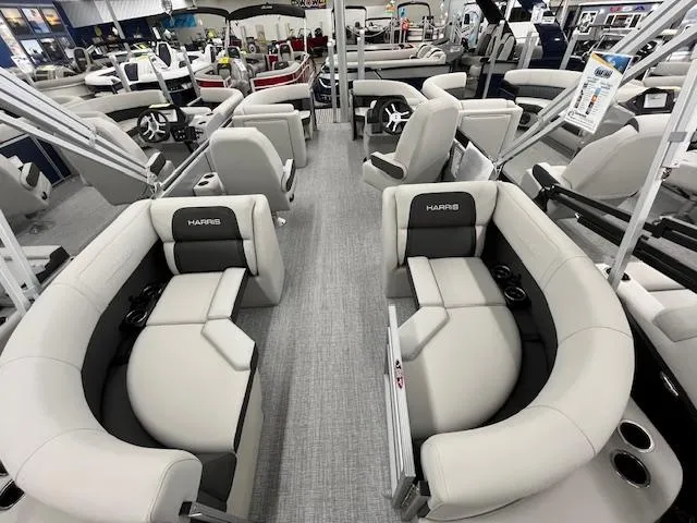 Slide: The Image of 2025 Harris Cruiser 210 pontoon boat interior with luxurious seating and modern design. - 8