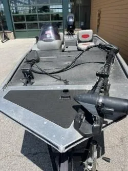 Slide: The Image of 2015 Tracker Pro 170 fishing boat with trolling motor and seating. - 5