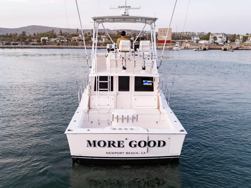 Slide: The Image of 2002 Cabo 35 Flybridge boat named "More Good" in Newport Beach harbor. - 7