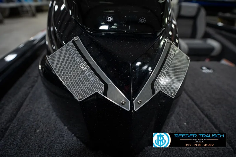 Slide: The Image of 2026 Lund 1775 Renegade boat dashboard with steering wheel and control panel. - 25