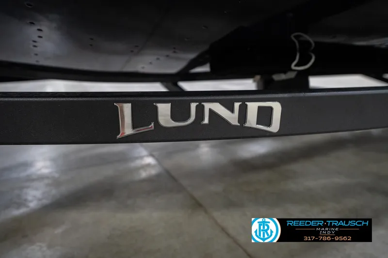 Slide: The Image of Dashboard of 2026 Lund 1775 Renegade boat with speedometer and controls. - 30