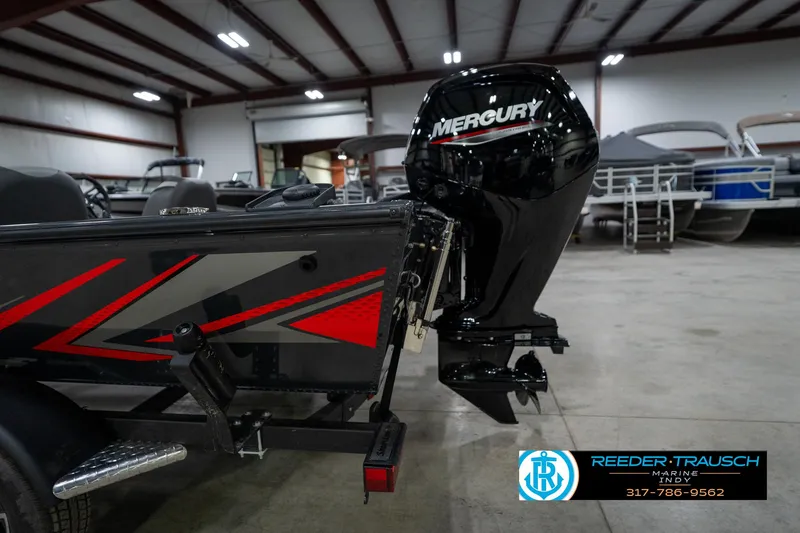 Slide: The Image of Mercury FourStroke engine on 2026 Lund 1775 Renegade boat in showroom. - 37