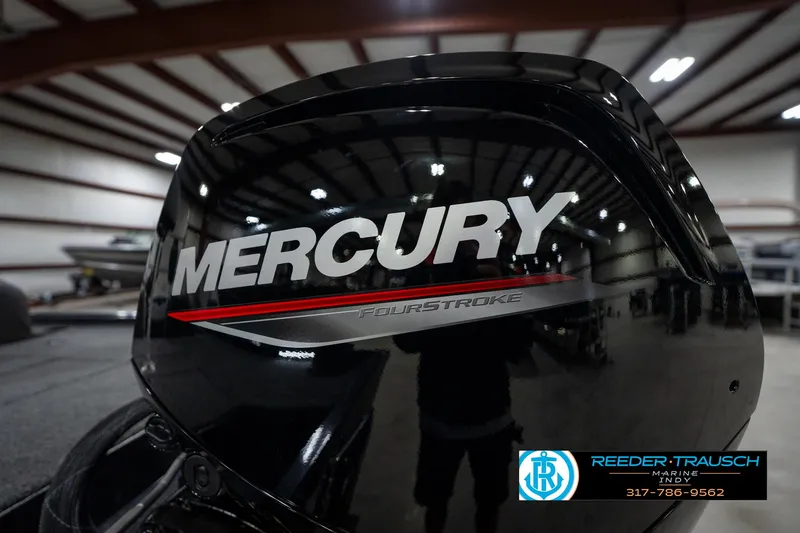 Slide: The Image of 2026 Lund 1775 Renegade boat with Mercury 90 engine in showroom. - 38