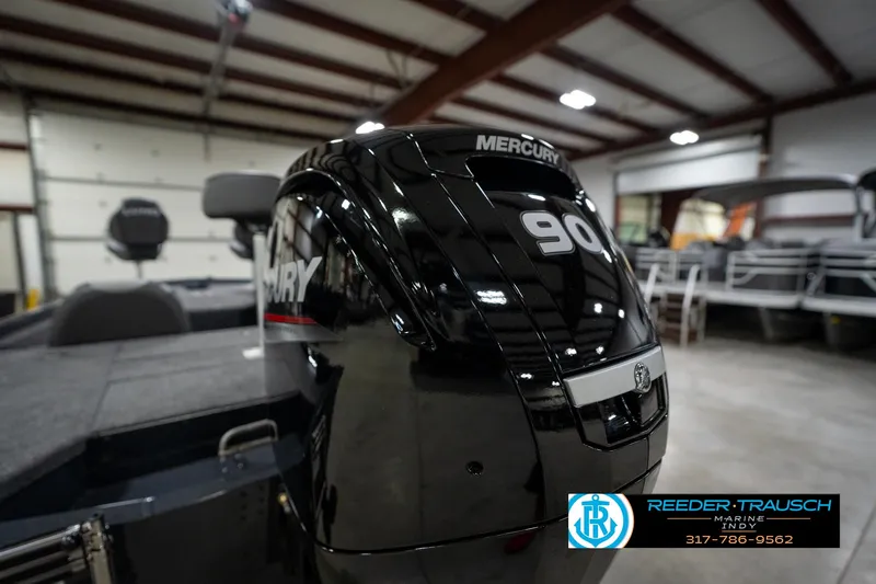 Slide: The Image of Close-up of a 2026 Lund 1775 Renegade boat propeller, Reeder-Trausch Marine logo visible. - 39