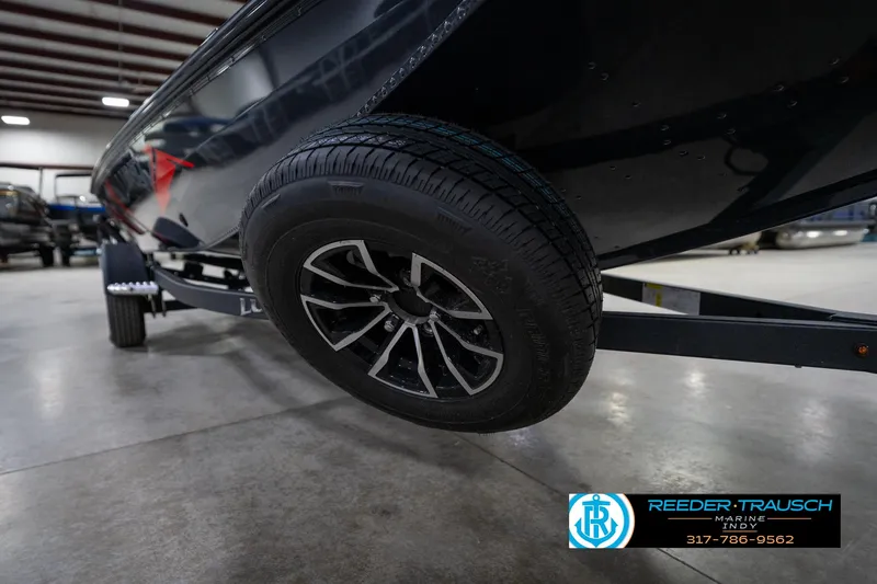 Slide: The Image of 2026 Lund 1775 Renegade boat with bold red and gray graphics. - 41