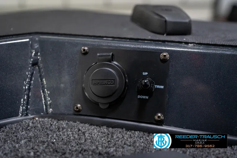 Slide: The Image of 2026 Lund 1775 Renegade trailer hitch with winch, displayed indoors at Reeder-Trausch Marine. - 43