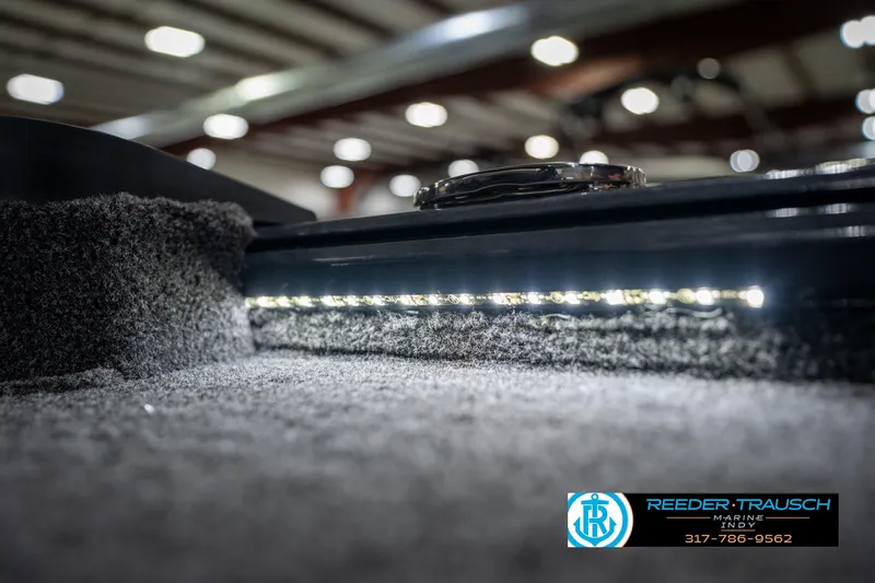 Slide: The Image of Trailer hitch of 2026 Lund 1775 Renegade boat on showroom floor. - 44