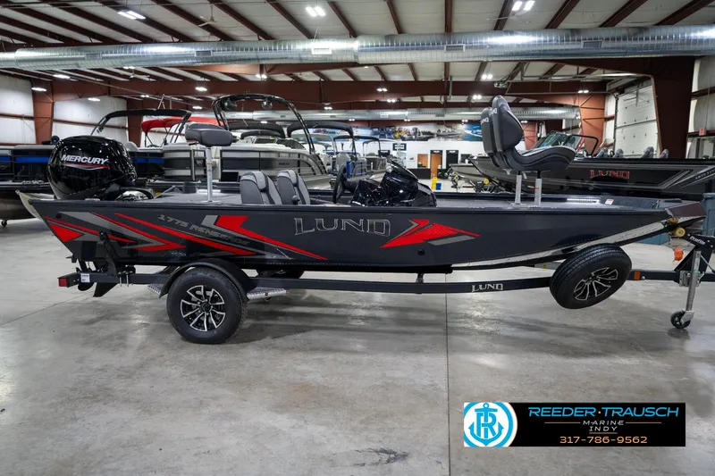 Slide: The Image of 2026 Lund 1775 Renegade boat with Mercury engine in showroom, Reeder-Trausch Marine. - 5