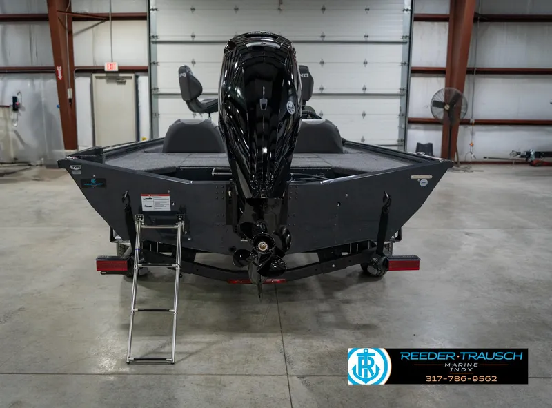 Slide: The Image of 2026 Lund 1775 Renegade boat with Mercury engine in showroom. - 7