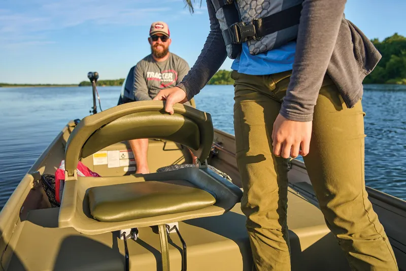 Slide: The Image of Manufacturer Provided Image: 2026 Tracker Grizzly 14 Jon boat on a lake with two people onboard. - 44